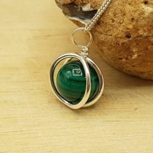 Minimalist Green Malachite circle pendant necklace. Crystal Reiki jewelry uk. Sterling silver 3d frame necklaces for women | Natural genuine Array jewelry. Buy crystal jewelry, handmade handcrafted artisan jewelry for women.  Unique handmade gift ideas. #jewelry #beadedjewelry #beadedjewelry #gift #shopping #handmadejewelry #fashion #style #product #jewelry #affiliate #ad