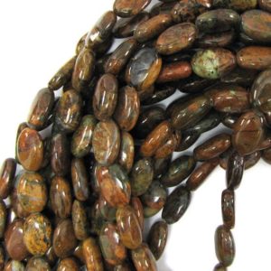 Shop Opal Bead Shapes! 10mm brown green opal flat oval beads 16" strand 11596 | Natural genuine other-shape Opal beads for beading and jewelry making.  #jewelry #beads #beadedjewelry #diyjewelry #jewelrymaking #beadstore #beading #affiliate #ad