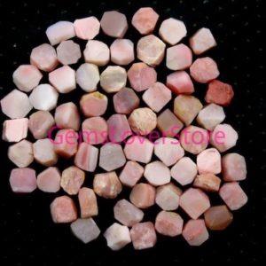 Shop Raw & Rough Opal Stones! 25 Piece Pink Crystal Gems Raw Size 10-12 MM Healing Crystal Raw Natural Pink Opal Gemstone,Untreated Hand Cut Loose Rough Pink Opal Crystal | Natural genuine stones & crystals in various shapes & sizes. Buy raw cut, tumbled, or polished gemstones for making jewelry or crystal healing energy vibration raising reiki stones. #crystals #gemstones #crystalhealing #crystalsandgemstones #energyhealing #affiliate #ad