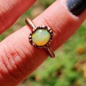 Shop Opal Rings! Round Ethiopian Fire Opal Copper Ring/ Natural Real Fire Opal Ring/ Copper Electroformed/ Flashy Gemstone Ring/ Multi Color Crystal Ring | Natural genuine Opal rings, simple unique handcrafted gemstone rings. #rings #jewelry #shopping #gift #handmade #fashion #style #affiliate #ad