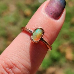 Shop Opal Rings! Small Ethiopian Fire Opal Ring/ Raw Fire Opal Copper Ring/ Copper Electroformed/ Dainty Fire Opal Gemstone Ring/ Flashy Fiery Rainbow Opal | Natural genuine Opal rings, simple unique handcrafted gemstone rings. #rings #jewelry #shopping #gift #handmade #fashion #style #affiliate #ad