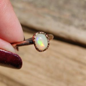 Shop Opal Rings! Small Opal Ring/ Raw Copper Gemstone Ring/ Natural Ethiopian Welo Fire Opal/ Real Opal/ Dainty Round Opal Ring/ Colorful Opal Copper Ring | Natural genuine Opal rings, simple unique handcrafted gemstone rings. #rings #jewelry #shopping #gift #handmade #fashion #style #affiliate #ad