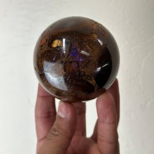 Shop Opal Shapes! Koroit Boulder Opal Sphere (70mm) Australia | Natural genuine stones & crystals in various shapes & sizes. Buy raw cut, tumbled, or polished gemstones for making jewelry or crystal healing energy vibration raising reiki stones. #crystals #gemstones #crystalhealing #crystalsandgemstones #energyhealing #affiliate #ad