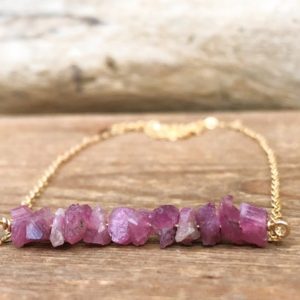 Shop Pink Tourmaline Necklaces! Raw Pink Tourmaline Stone Necklace In 14k Gold Fill, 14k Rose Gold Fill Or Sterling Silver | Natural genuine Pink Tourmaline necklaces. Buy crystal jewelry, handmade handcrafted artisan jewelry for women.  Unique handmade gift ideas. #jewelry #beadednecklaces #beadedjewelry #gift #shopping #handmadejewelry #fashion #style #product #necklaces #affiliate #ad