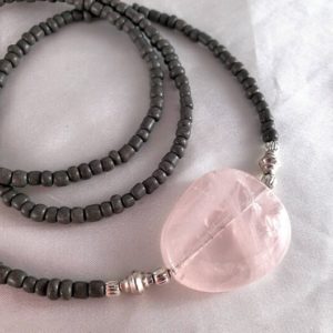 Shop Rose Quartz Necklaces! Minimalist boho rose quartz necklace. Irregular pebble gemstone. Ultra long, layering jewelry. Pink & gray, textured silver accents. | Natural genuine Rose Quartz necklaces. Buy crystal jewelry, handmade handcrafted artisan jewelry for women.  Unique handmade gift ideas. #jewelry #beadednecklaces #beadedjewelry #gift #shopping #handmadejewelry #fashion #style #product #necklaces #affiliate #ad