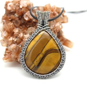 Shop Tiger Eye Pendants! Tiger Eye and Sterling Silver Wire Woven Pendant. Nature Lovers Gift. Outdoor Enthusiast Hiker Gift. Mens Natural Stone Jewelry | Natural genuine Tiger Eye pendants. Buy handcrafted artisan men's jewelry, gifts for men.  Unique handmade mens fashion accessories. #jewelry #beadedpendants #beadedjewelry #shopping #gift #handmadejewelry #pendants #affiliate #ad