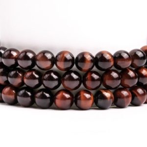 Shop Tiger Eye Round Beads! Natural Mahogany Red Tiger Eye Gemstone Grade AAA Round 4mm 6mm 8mm 10mm 12mm Loose Beads | Natural genuine round Tiger Eye beads for beading and jewelry making.  #jewelry #beads #beadedjewelry #diyjewelry #jewelrymaking #beadstore #beading #affiliate #ad