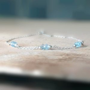 Sky Blue Topaz Delicate Bracelet Minimalist Sterling Silver Chain Bracelet Birthstone Jewelry December Jewelry 4th Anniversary Gifts For Her | Natural genuine Topaz bracelets. Buy crystal jewelry, handmade handcrafted artisan jewelry for women.  Unique handmade gift ideas. #jewelry #beadedbracelets #beadedjewelry #gift #shopping #handmadejewelry #fashion #style #product #bracelets #affiliate #ad