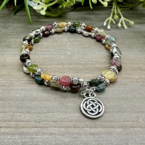 Shop Tourmaline Bracelets! Multicolor Tourmaline Coin Stone Memory Wire Celtic Knot Bracelet | Beaded Cuff Bracelet | Wrap Stone Bracelet – one size fits most | Natural genuine Tourmaline bracelets. Buy crystal jewelry, handmade handcrafted artisan jewelry for women.  Unique handmade gift ideas. #jewelry #beadedbracelets #beadedjewelry #gift #shopping #handmadejewelry #fashion #style #product #bracelets #affiliate #ad