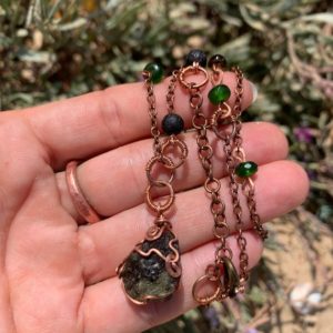 Shop Moldavite Necklaces! Wire Wrapped Moldavite Necklace with Tektite Garnet Beads | Natural genuine Moldavite necklaces. Buy crystal jewelry, handmade handcrafted artisan jewelry for women.  Unique handmade gift ideas. #jewelry #beadednecklaces #beadedjewelry #gift #shopping #handmadejewelry #fashion #style #product #necklaces #affiliate #ad