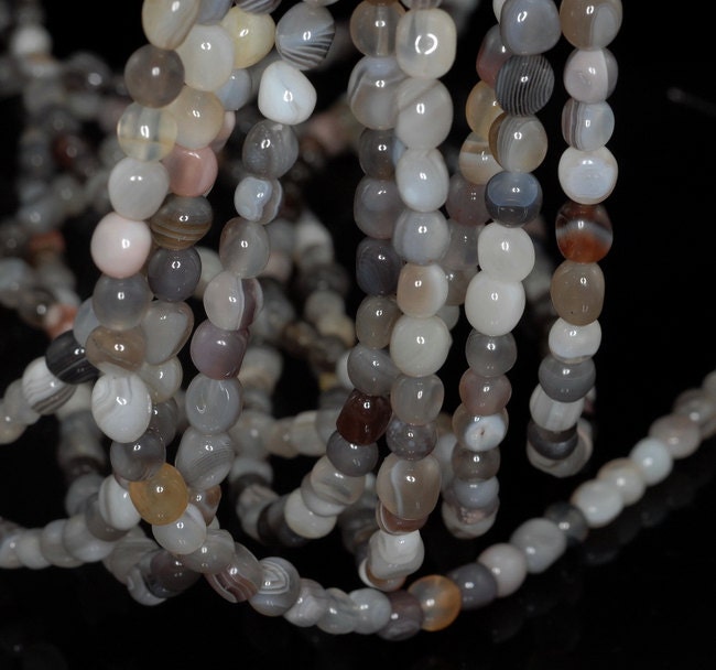 Botswana Agate Gemstone Grey Pebble 9x9-6x5mm Loose Beads 7.5 Inch Half Strand (90143508-b63) Botswana Agate Gemstone Grey Pebble 9x9-6x5mm Loose Beads 7.5 Inch Half Strand (90143508-b63)