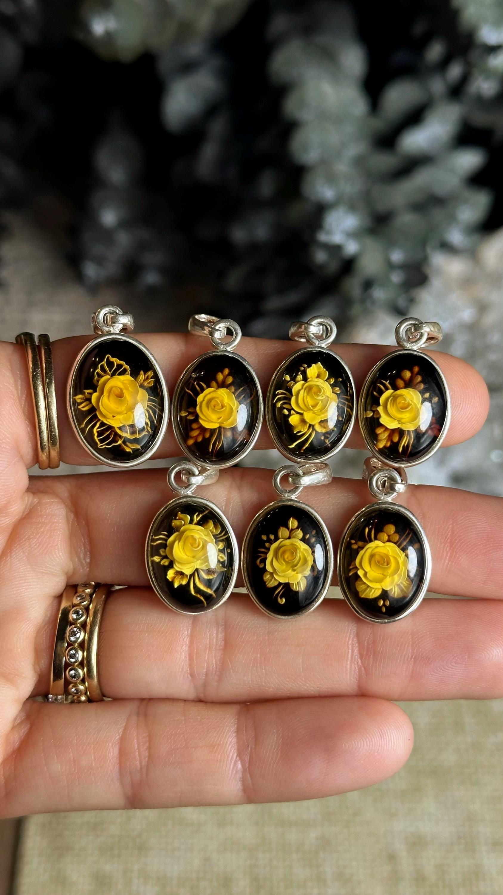 Hand Carved Rose Amber Necklace: .925 Sterling Silver Hand Carved Rose Amber Necklace: .925 Sterling Silver