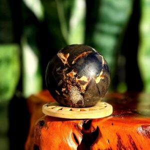 Blue Amber sphere w/ stand - from Indonesia - UV reactive - for ancient wisdom and connection to earth - fossilized wood
