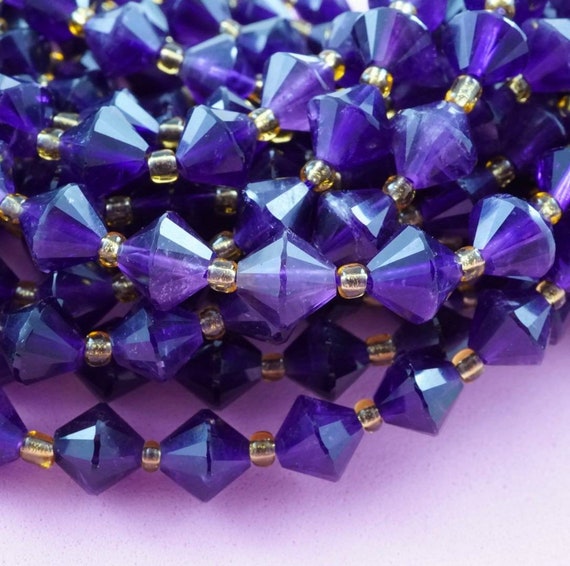 Amethyst Beads (bicone)(faceted)(8mm)(16"strand)