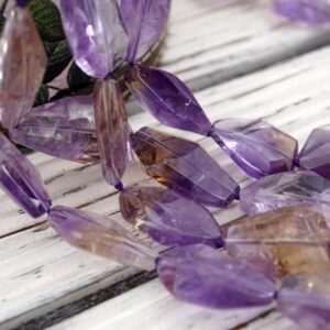 Faceted Ametrine Quartz Beads, Brazil, 16-inch Strand Faceted Ametrine Quartz Beads, Brazil, 16-inch Strand