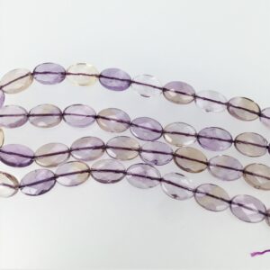 Ametrine faceted oval beads 10x14mm. Natural ametrine beads. Light purple yellow beads. Ametrine faceted oval beads 10x14mm. Natural ametrine beads. Light purple yellow beads.