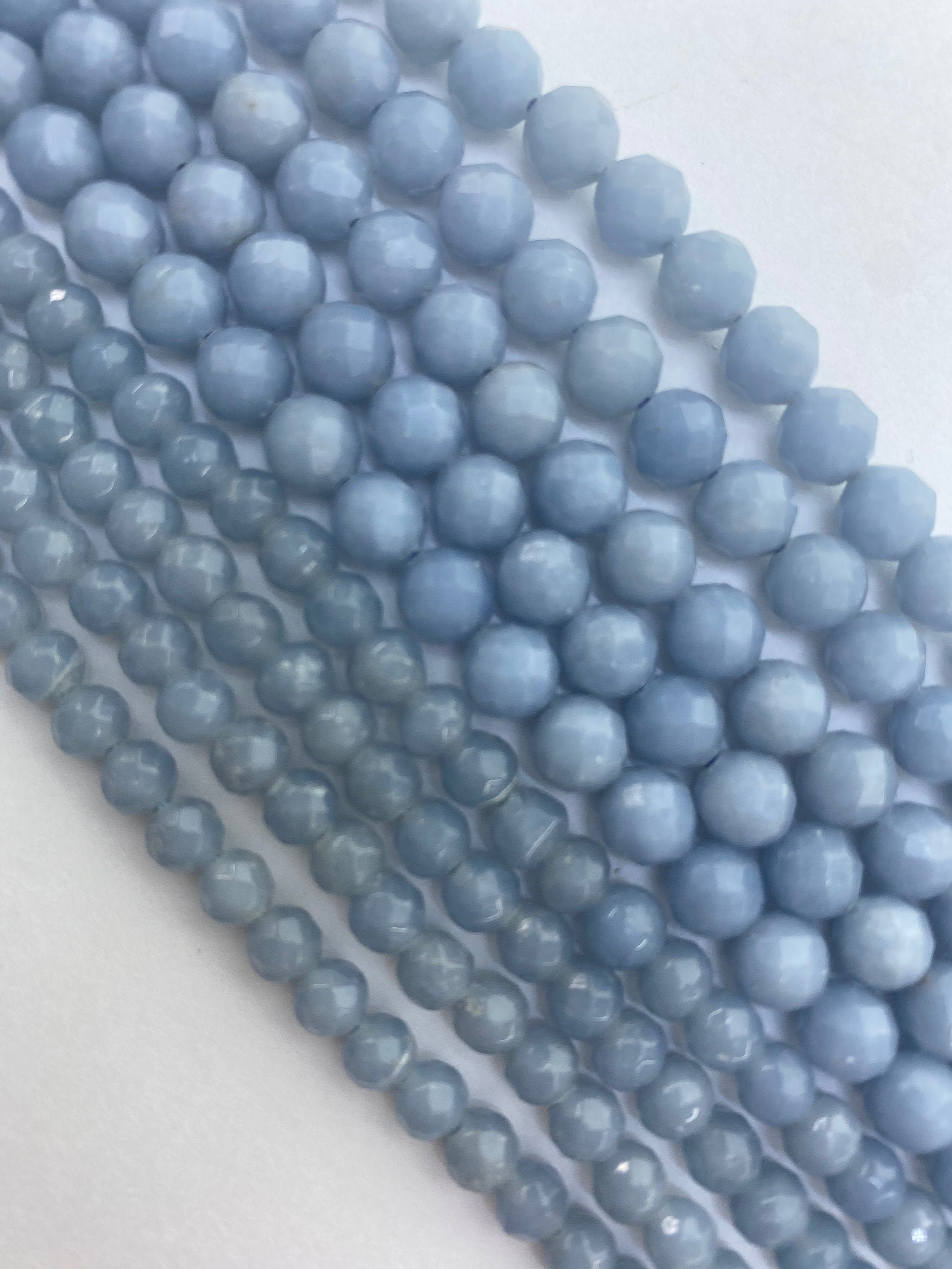 Faceted Angelite Gemstone Beads.  15” Strands Of Faceted Round Angelite Beads, Available In 5mm And 7mm. Also Called Blue Angel.