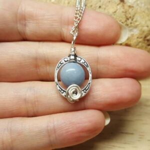 Blue Angelite Pendant. Reiki Jewelry Uk. Small Oval Frame Pendant. Blue Angelite Pendant. Reiki Jewelry Uk. Small Oval Frame Pendant.