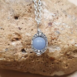 Tiny Blue Angelite Pendant. Reiki Jewelry Uk. Oval Frame Pendant. Tiny Blue Angelite Pendant. Reiki Jewelry Uk. Oval Frame Pendant.