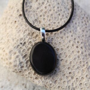 Apache Tears Palm Stone on a Leather Cord Necklace Apache Tears Palm Stone on a Leather Cord Necklace