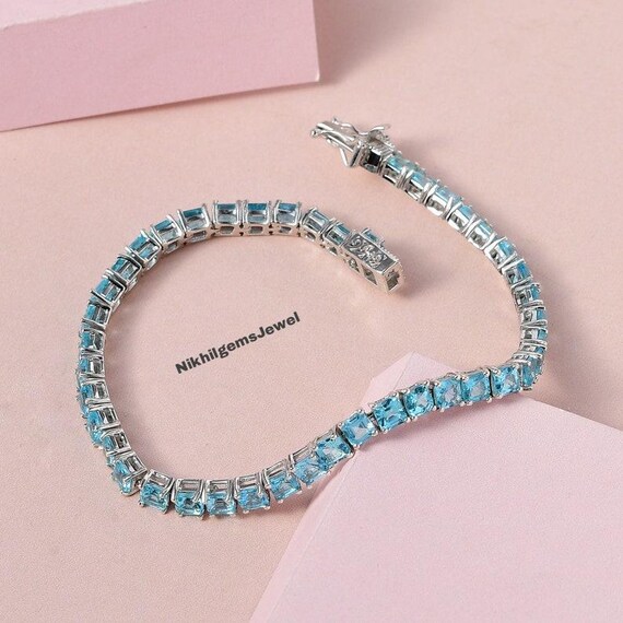 Asscher Cut Paraiba Apatite Tennis Bracelet: Platinum Over Sterling Silver