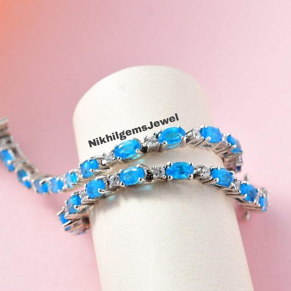 Neon Apatite & Moissanite Bracelet: Platinum Over Sterling Silver