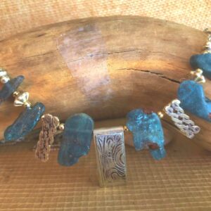 Raw Blue Apatite Bib Necklace: Sterling Silver Swirl Pendant