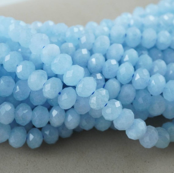 Aquamarine Beads (rondelle)(faceted)(6x4mm)(15.5"strand) Aquamarine Beads (rondelle)(faceted)(6x4mm)(15.5"strand)