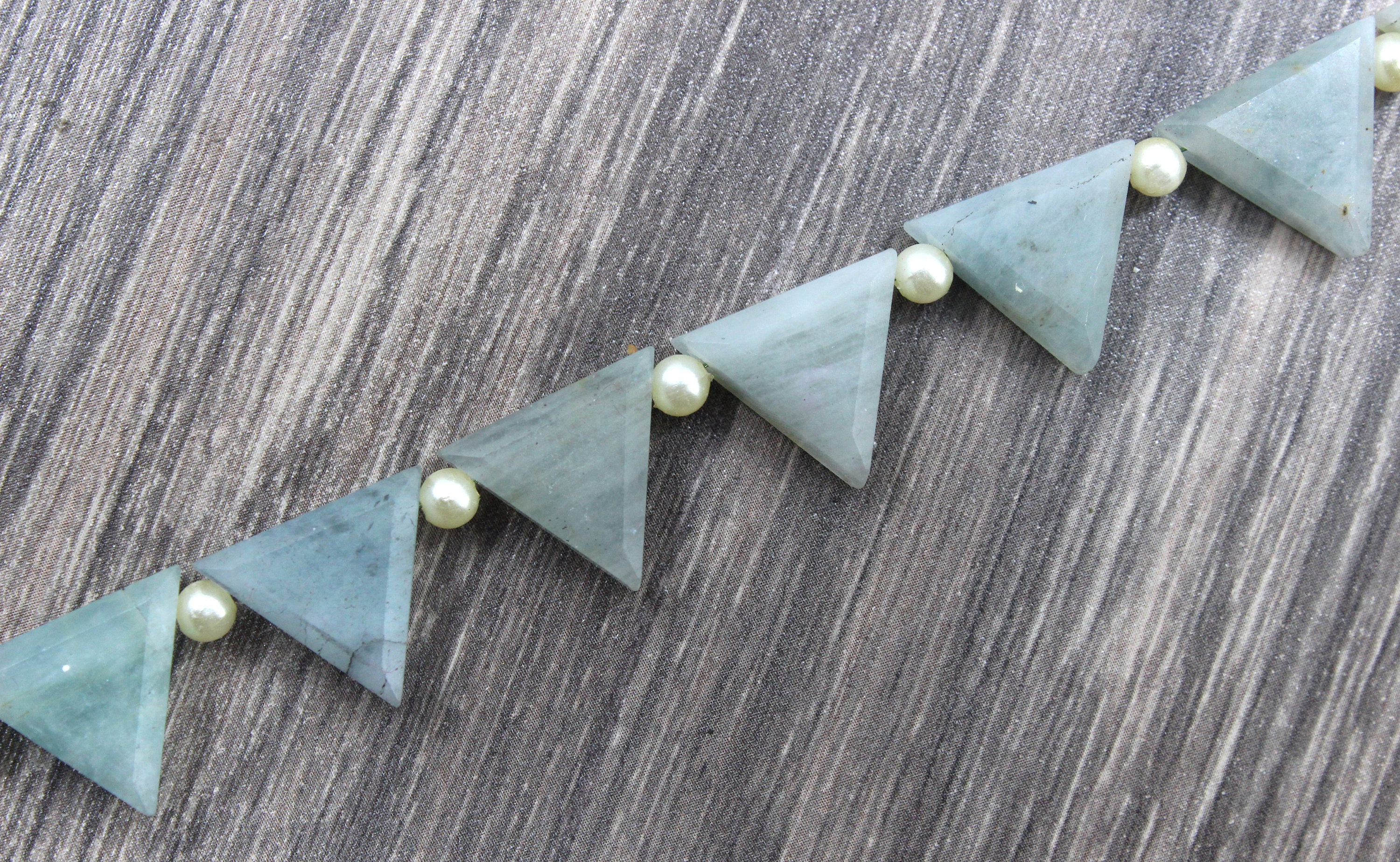 Faceted Aquamarine Trillion Briolette Beads: 11 Piece Strand (12x12-14x14 Mm) Faceted Aquamarine Trillion Briolette Beads: 11 Piece Strand (12x12-14x14 Mm)