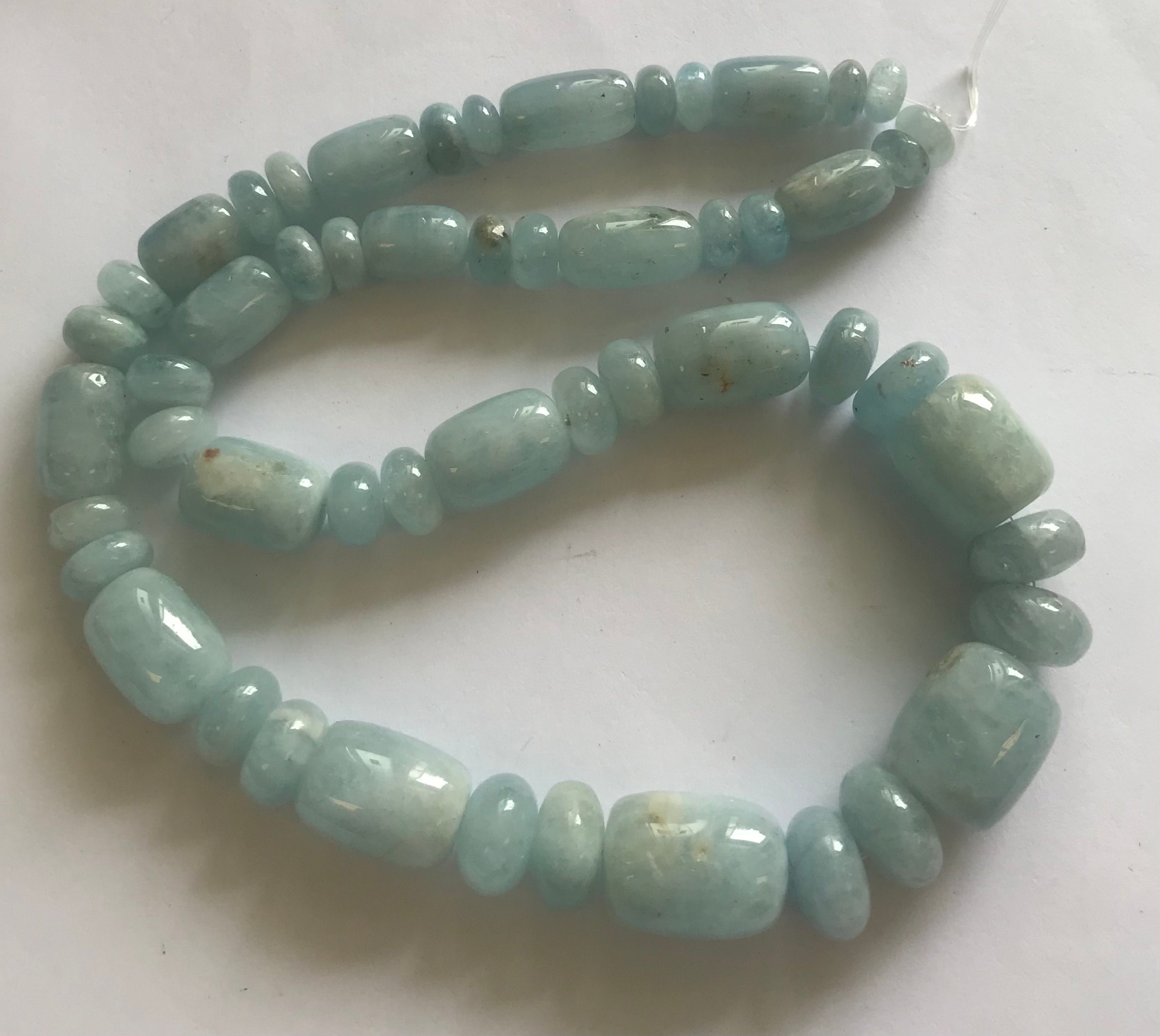 Natural Aquamarine (8x4-14x6)mm-(10x8-16x14)mm Rondelle And Barrel Graduated Gemstone Beads--15.5 Inch Strand Natural Aquamarine (8x4-14x6)mm-(10x8-16x14)mm Rondelle And Barrel Graduated Gemstone Beads--15.5 Inch Strand