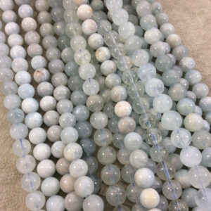 Glossy Aquamarine Round Beads: Natural Light Blue Gemstone Strand Glossy Aquamarine Round Beads: Natural Light Blue Gemstone Strand