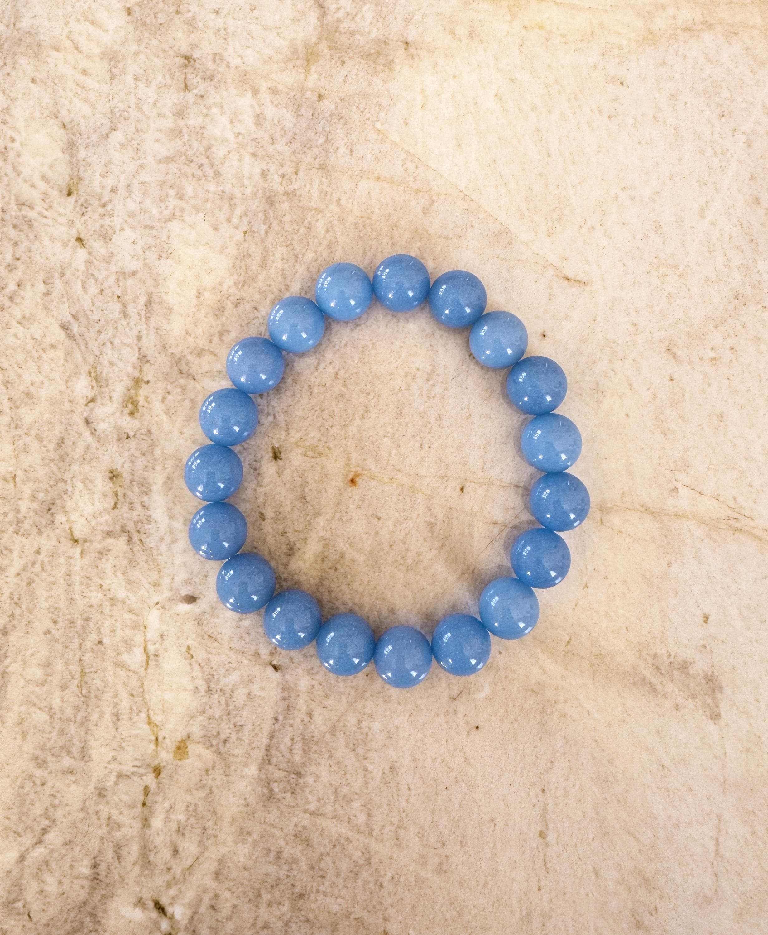 Blue Aragonite Cave Calcite Bracelet – 10mm Glows In Dark Beads Blue Aragonite Cave Calcite Bracelet – 10mm Glows In Dark Beads