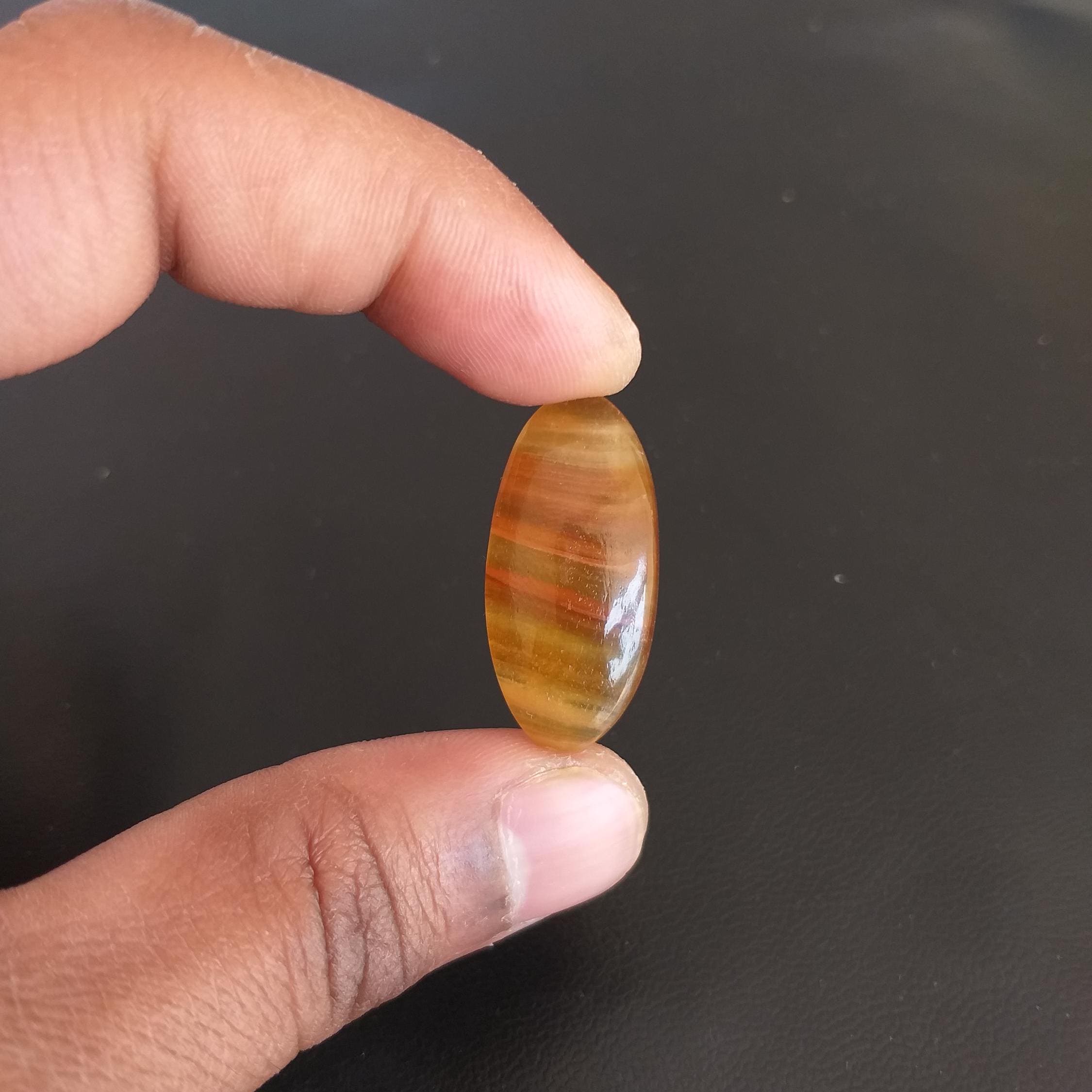 Yellow Aragonite Cabochon: 30 Carat Oval Gemstone, 32x16x8 Mm Yellow Aragonite Cabochon: 30 Carat Oval Gemstone, 32x16x8 Mm