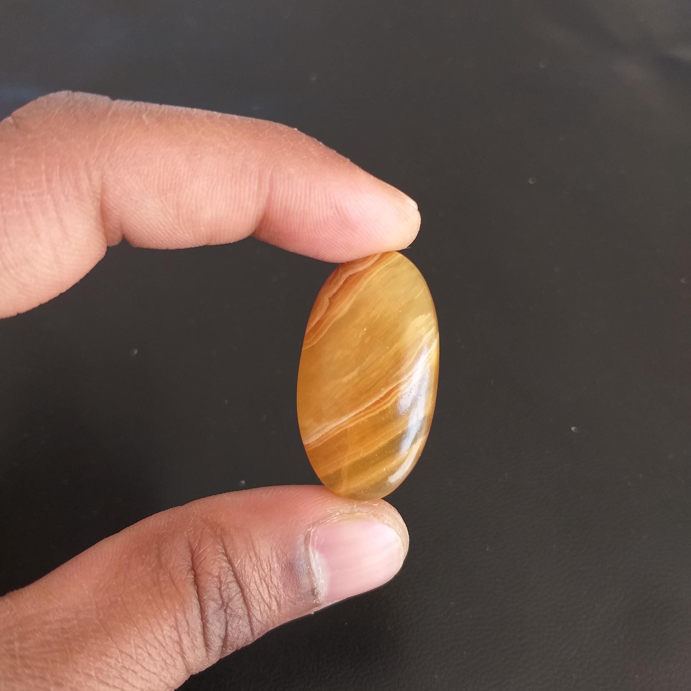 Yellow Aragonite Cabochon: 46.5 Carat Oval Gemstone, 37x21x8mm