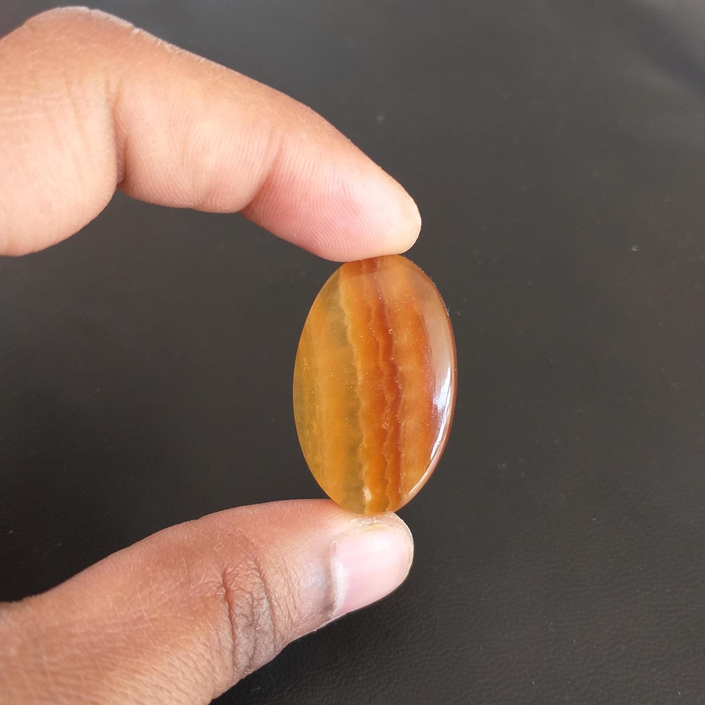 Yellow Aragonite Cabochon: 49 Carat Oval Gemstone, 38x24x7mm