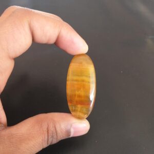 Yellow Aragonite Cabochon: 60.7 Carat Oval Gemstone, 48x21x7 Mm