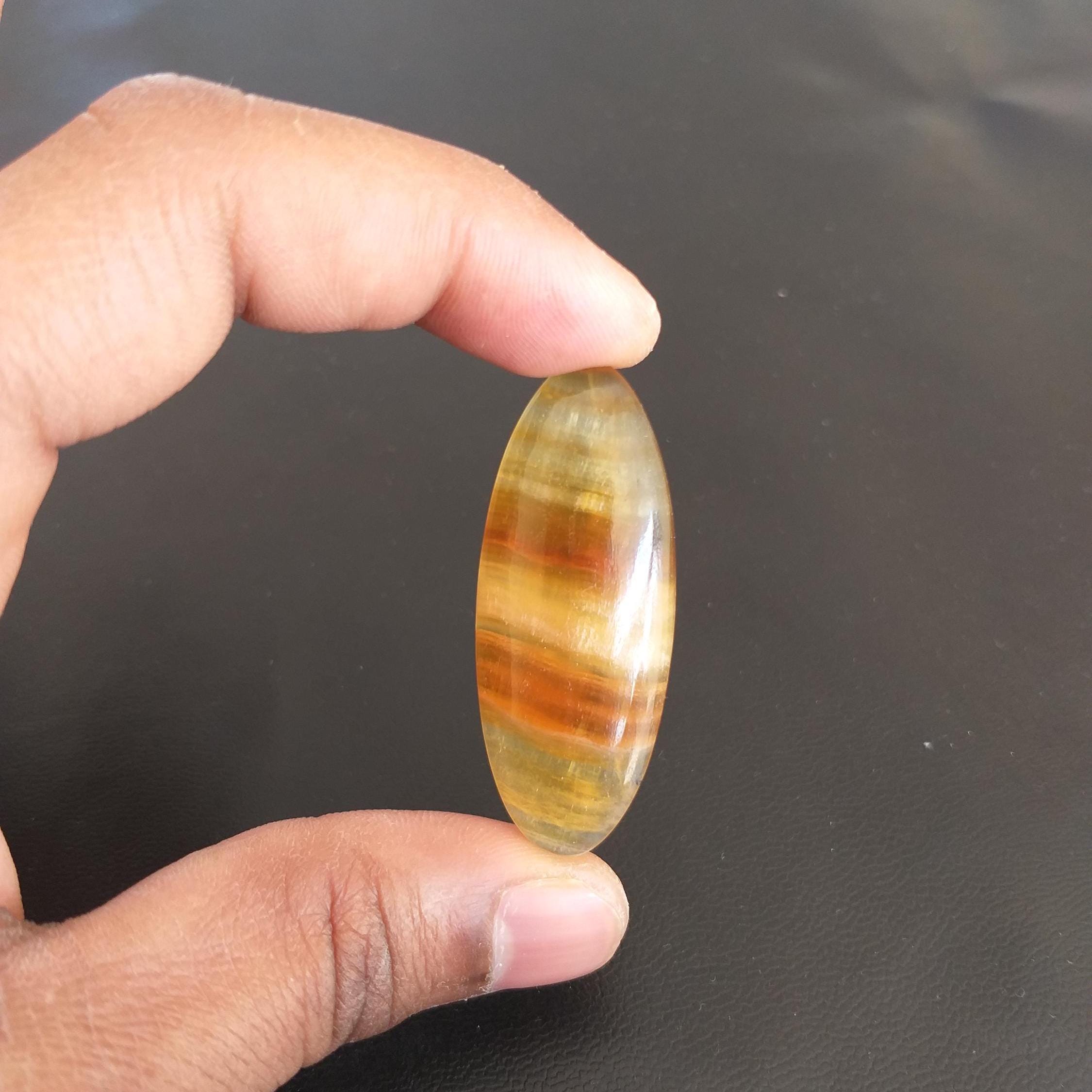 Yellow Aragonite Cabochon: Pear Shape, 46 Carat Gemstone, 50x26x6 Mm