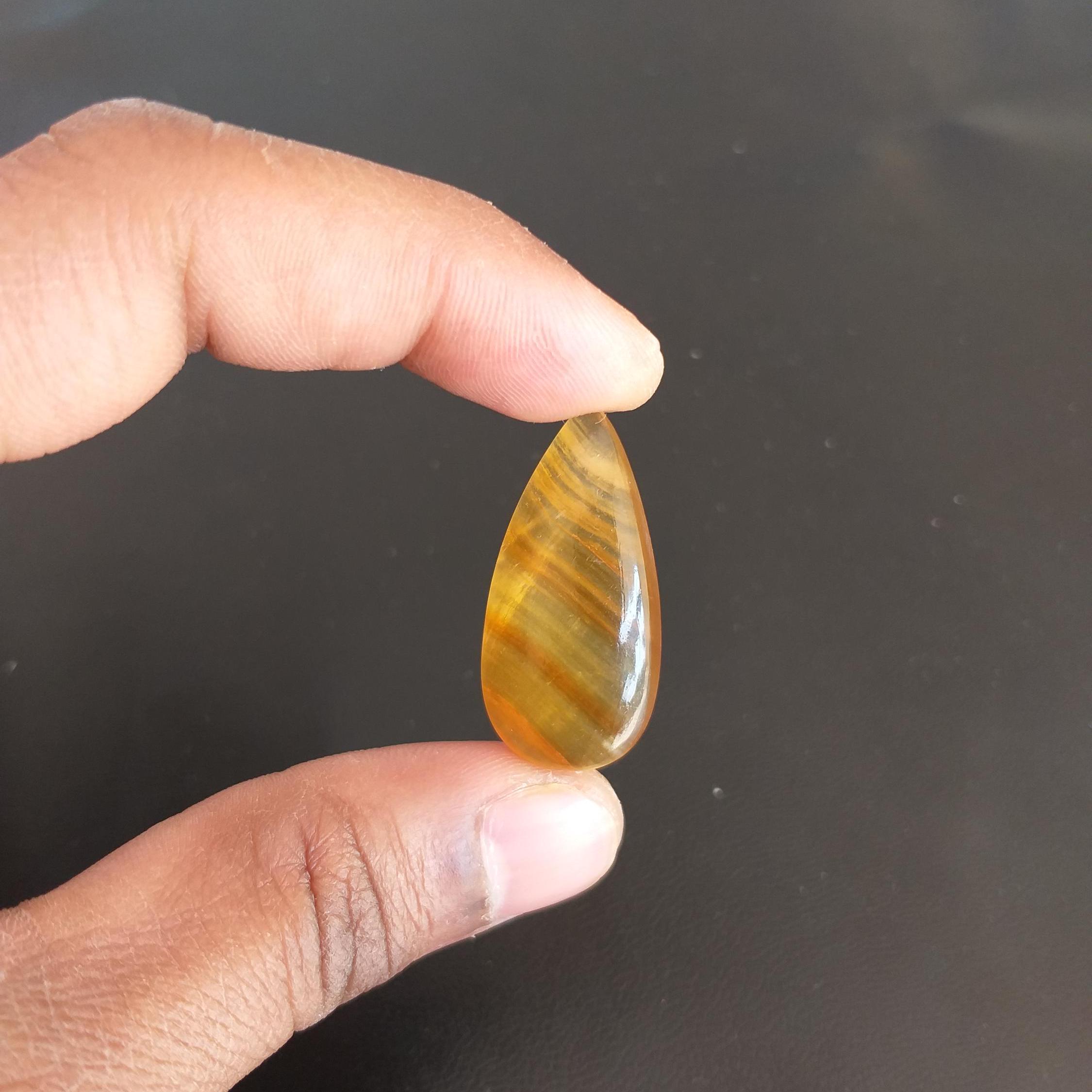 Yellow Aragonite Cabochon: Pear Shape Gemstone, 30.8 Carat Yellow Aragonite Cabochon: Pear Shape Gemstone, 30.8 Carat