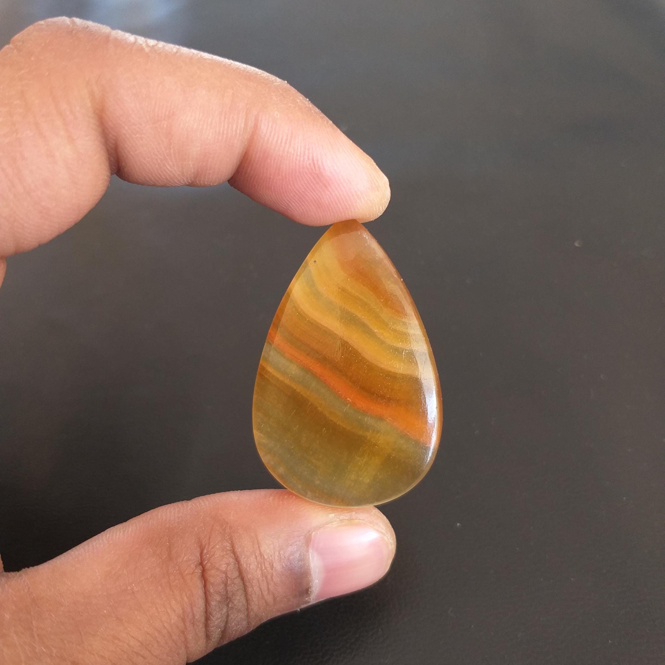 Yellow Aragonite Cabochon: Pear Shape Gemstone, 62.9 Carat, 45x30x6 Mm Yellow Aragonite Cabochon: Pear Shape Gemstone, 62.9 Carat, 45x30x6 Mm