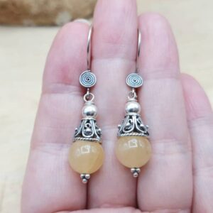 Aragonite cone earrings. Bali bead earrings. Capricorn Reiki jewelry uk. Yellow rare mineral dangle drop Wire wrap earrings