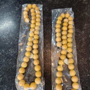 4 strands of 10-12mm Aragonite beads