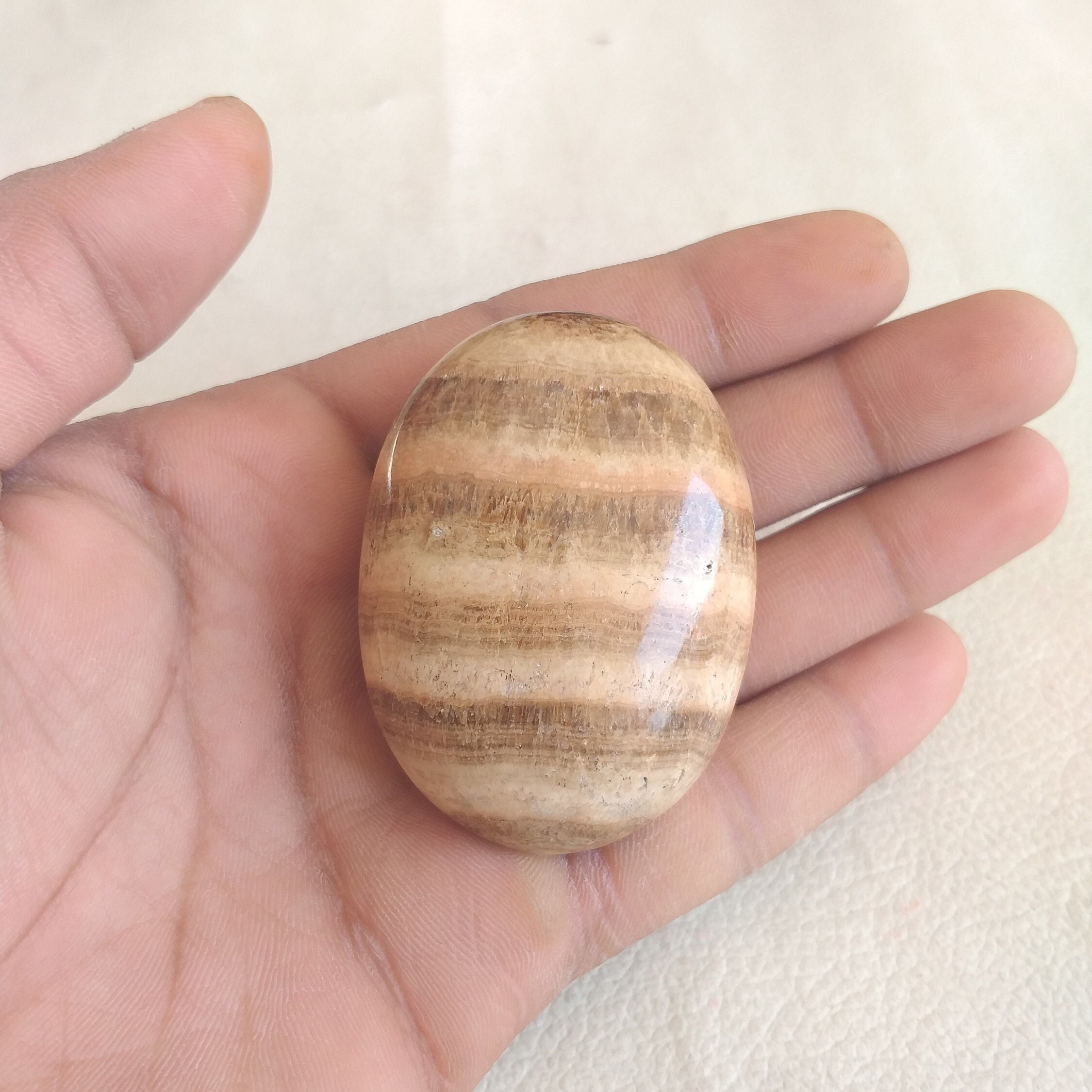 Polished Aragonite Palm Stone: Handmade Healing Crystal, Home Decor Polished Aragonite Palm Stone: Handmade Healing Crystal, Home Decor