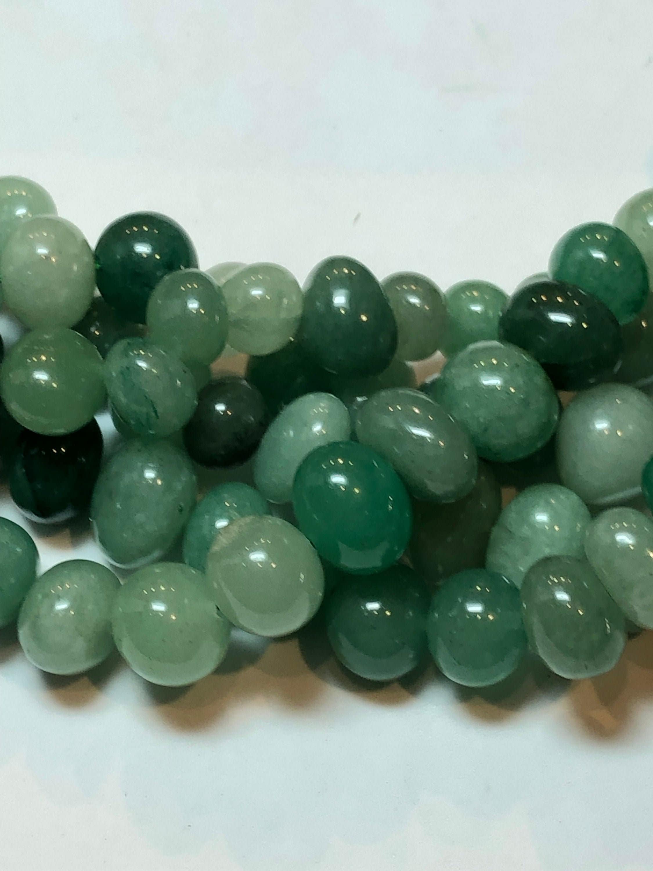Freeform Aventurine Nuggets. Full 15" Strand Of 10-12mm Aventurine Semi-round Nuggets, Approx. 54 Beads Per Strand. Irregular Potato Shape. Freeform Aventurine Nuggets. Full 15" Strand Of 10-12mm Aventurine Semi-round Nuggets, Approx. 54 Beads Per Strand. Irregular Potato Shape.