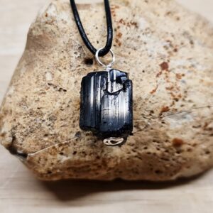 Raw black Tourmaline pendant. Raw crystal necklace. October birthstone. Reiki jewelry uk. Silver plated wire wrap. Empowered crystals.