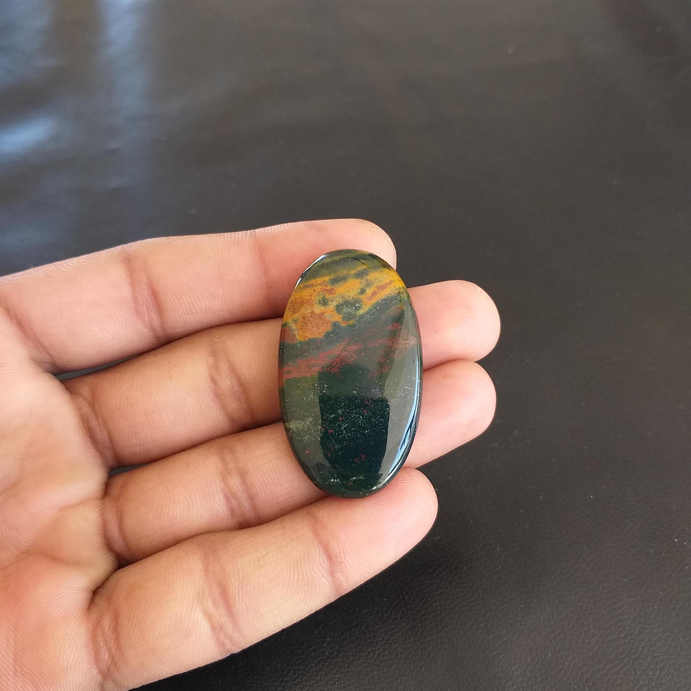 Oval Bloodstone Cabochon: 52.5 Carat Gemstone, 44x25x6 Mm