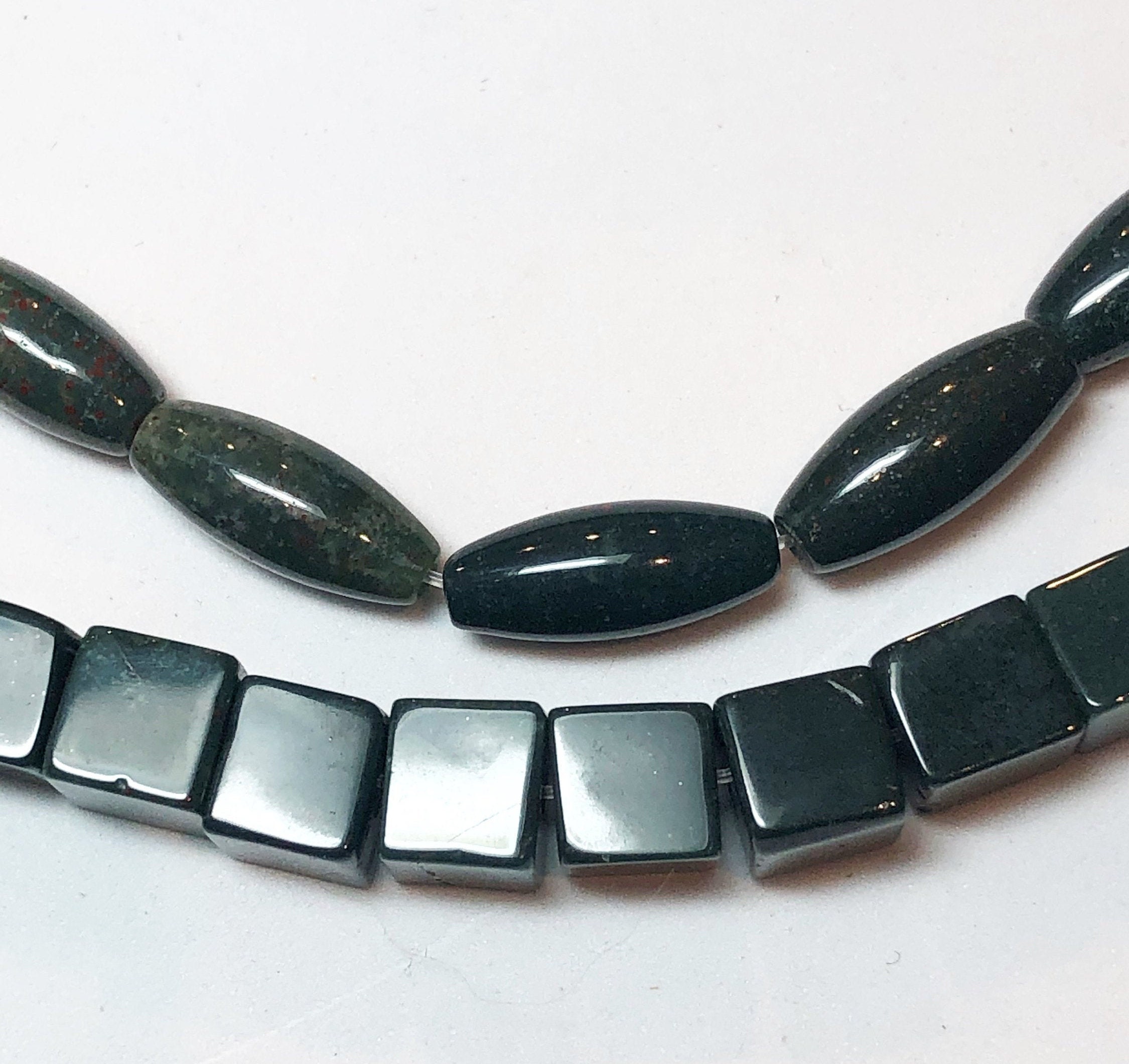 Dark Green Bloodstone Jasper, Available In Two Shapes: 6mm Cube And 5x12mm Rice. Full 15" Strand Of Deep Green Beads With Specks Of Red.