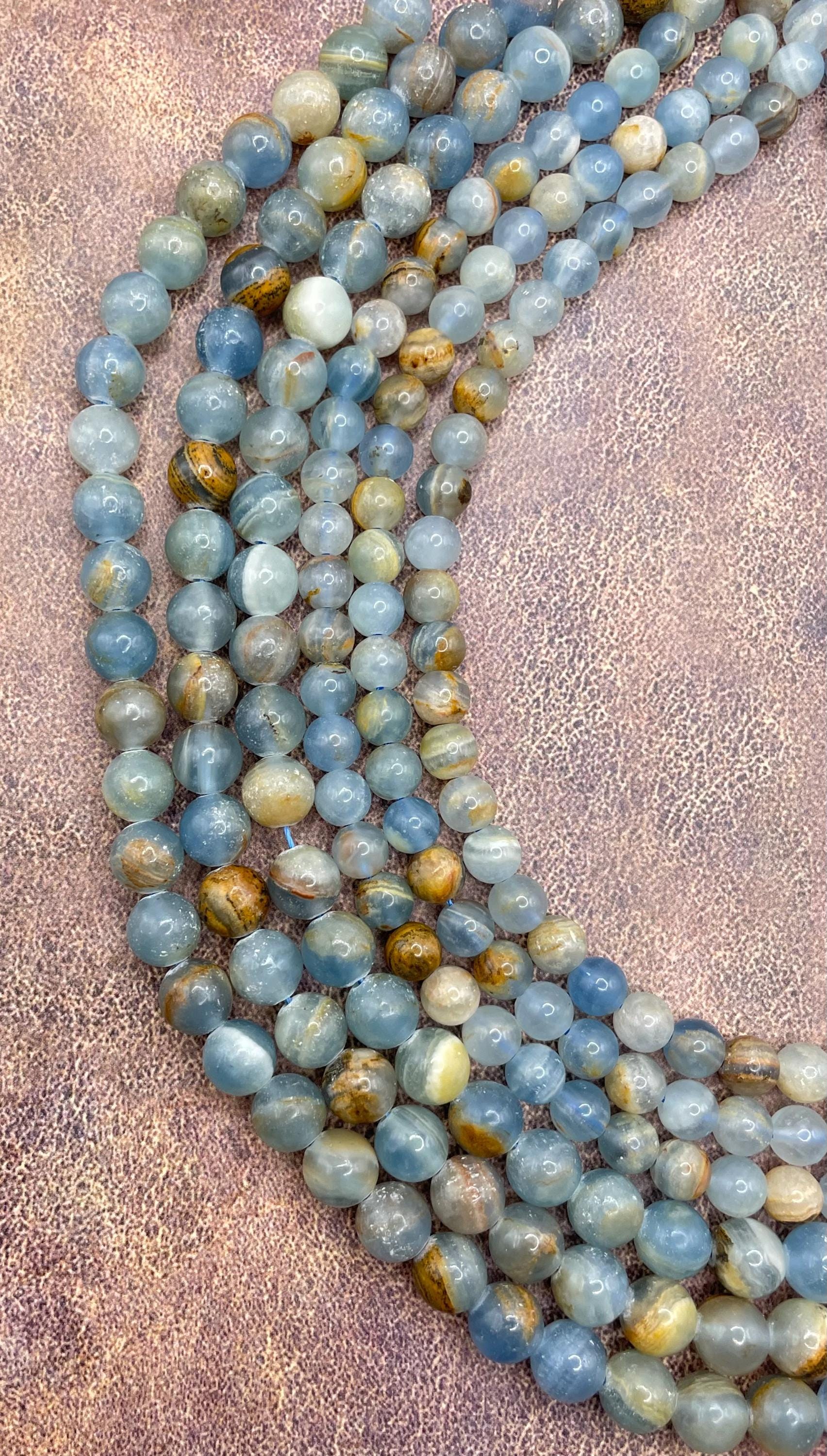 Argentina Lemurian Blue Calcite Gemstone Beads. 15” Strand Of Round Beads, Available In 6mm And 8mm.