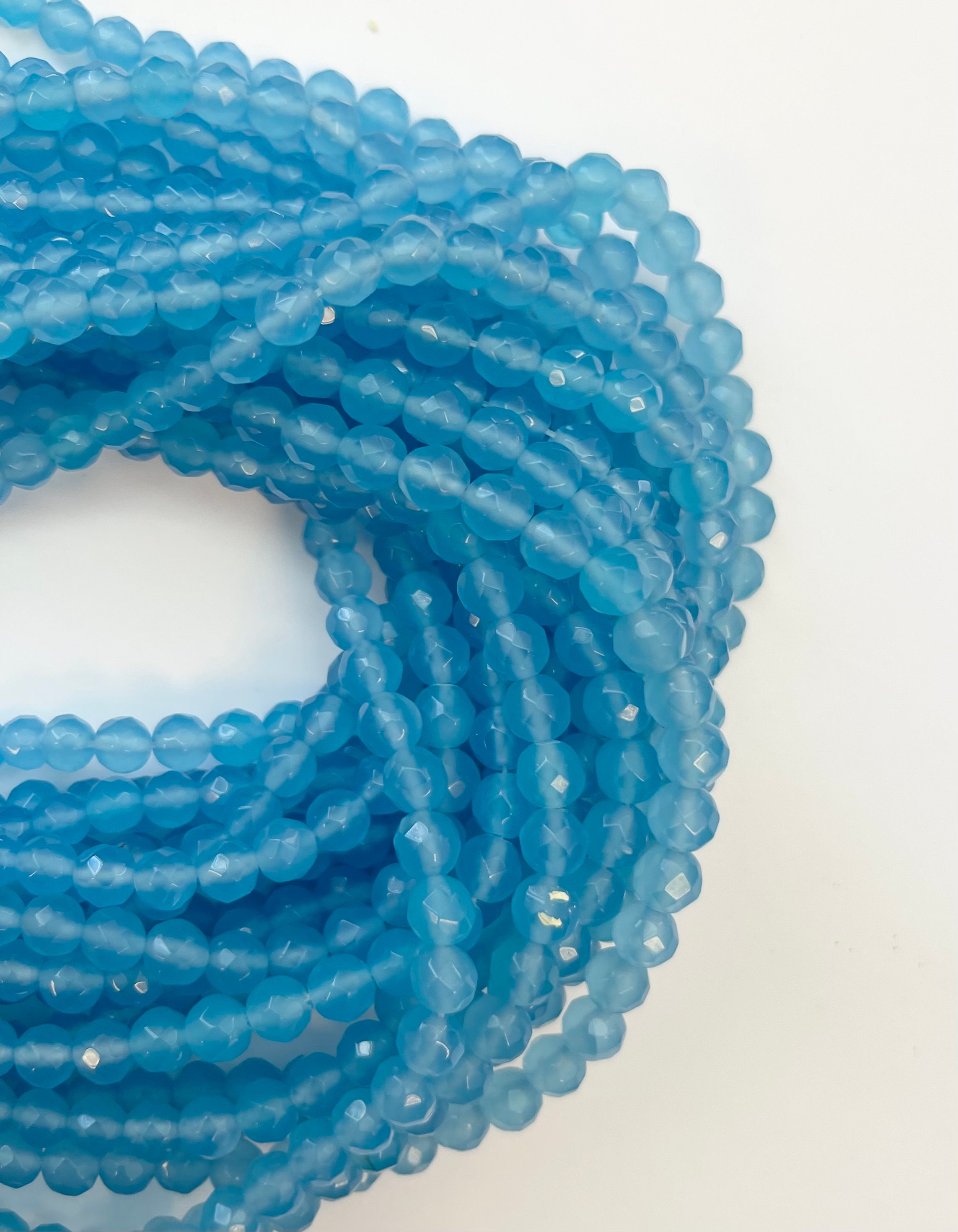 Blue Chalcedony 6mm Faceted Round Gemstone Beads--15.5 Inch Strand Blue Chalcedony 6mm Faceted Round Gemstone Beads--15.5 Inch Strand