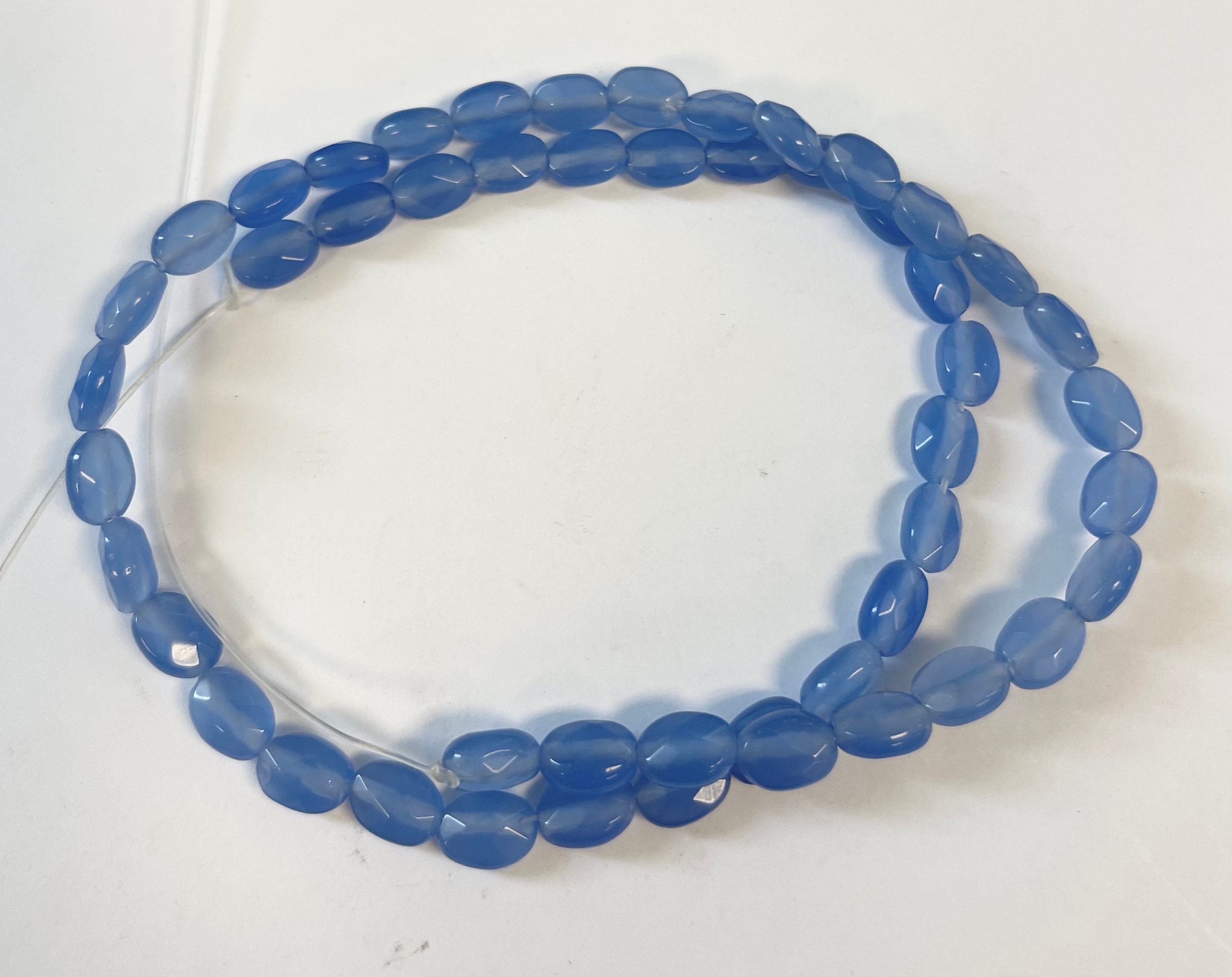 Blue Chalcedony 7x5x4mm Faceted Flat Oval Gemstone Beads -- 15.5"