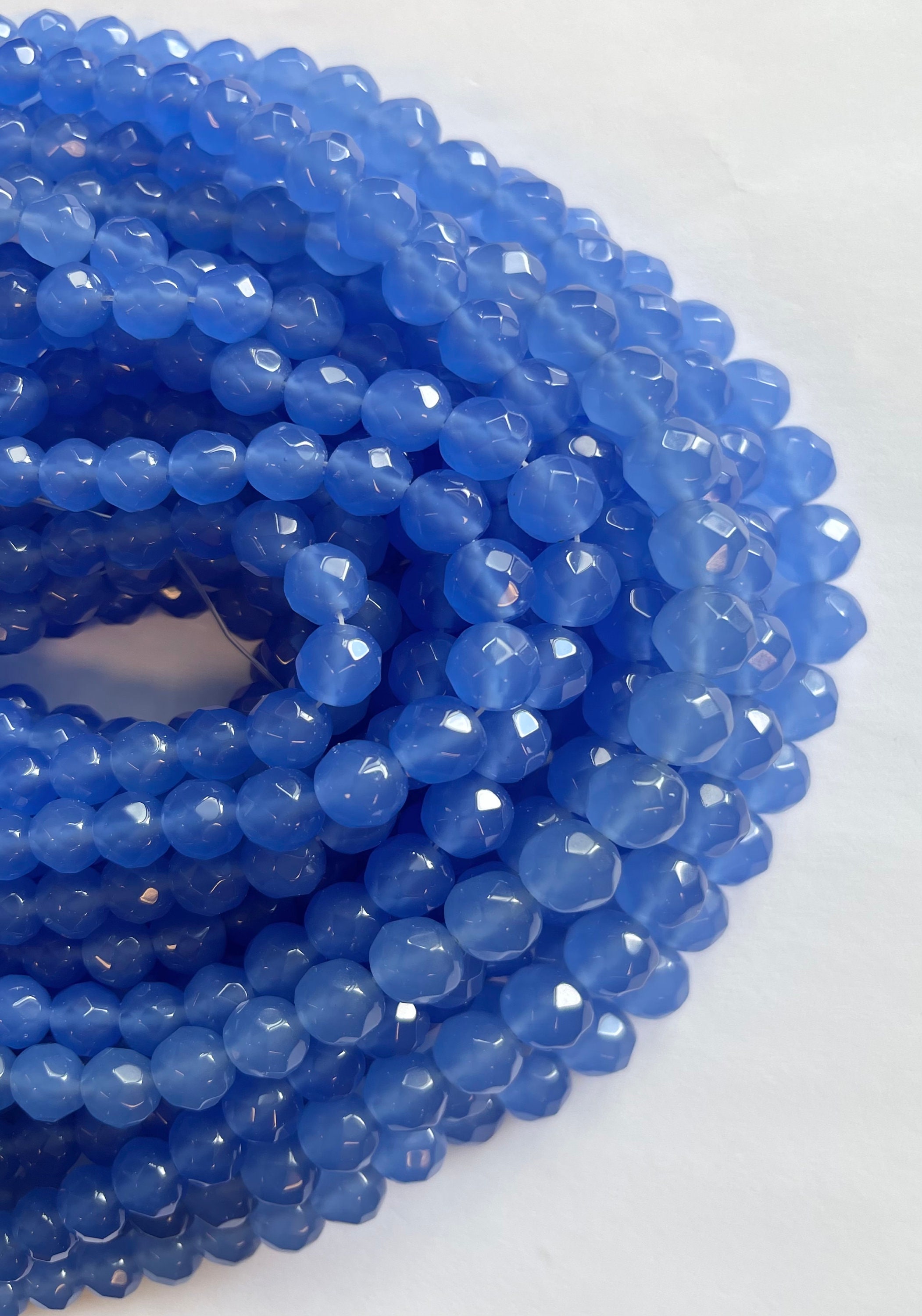Blue Chalcedony 8mm Faceted Round Gemstone Bead--15.5 Inch Strand Blue Chalcedony 8mm Faceted Round Gemstone Bead--15.5 Inch Strand